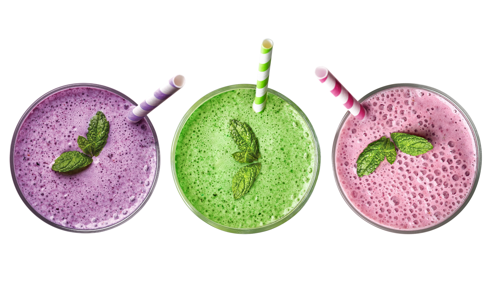 Three vibrant smoothies in purple, green, and pink, each topped with mint leaves and striped paper straws, viewed from above.