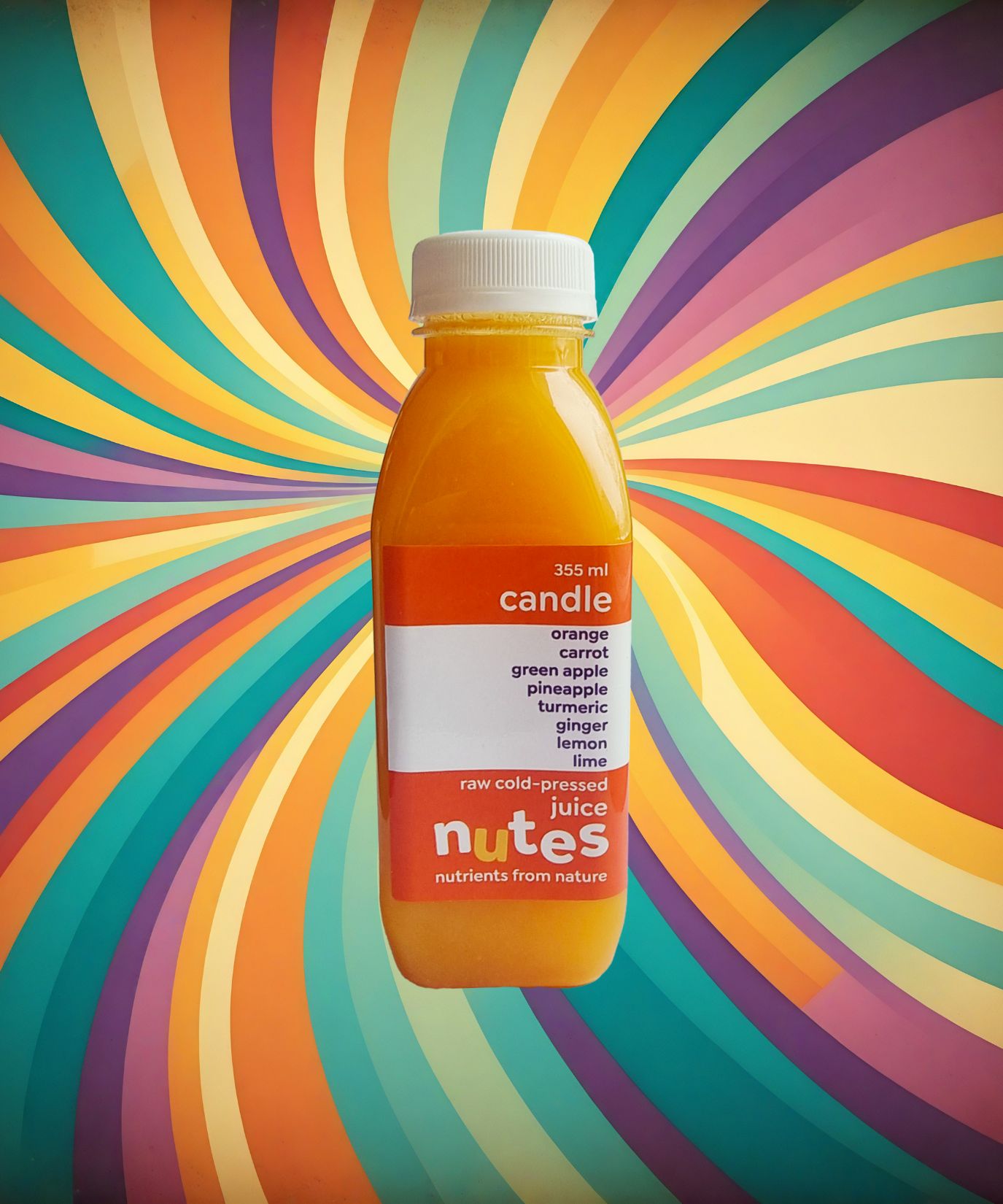 Nutes superfoods candle flavoured cold-pressed juice bottle with high-vibe background