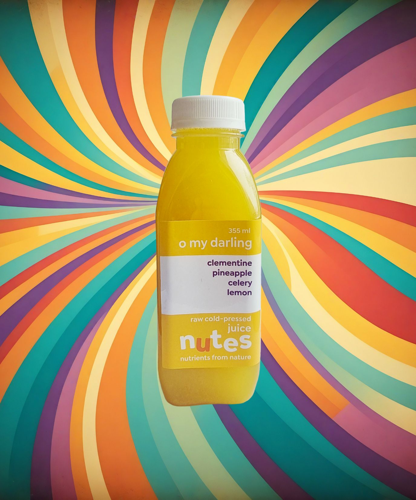 Nutes superfoods o my darling flavoured cold-pressed juice bottle with high-vibe background